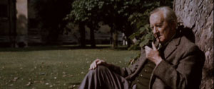 J.R.R. Tolkien, pondering with his pipe.